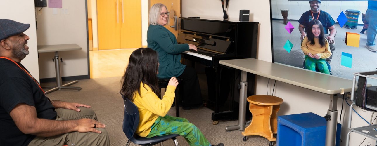 A child plays music with a virtual instrument