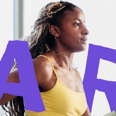 A young athlete running in a therapeutic gym.