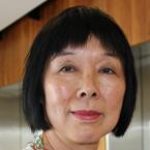Lam An adult with short black hair smiles